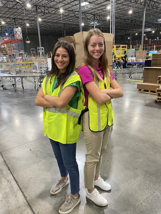 Lillian McCloud and friend standing in the Frito Lay warehouse