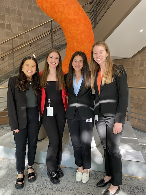 Lillian McCloud and her friends posing in the lobby of Frito Lay