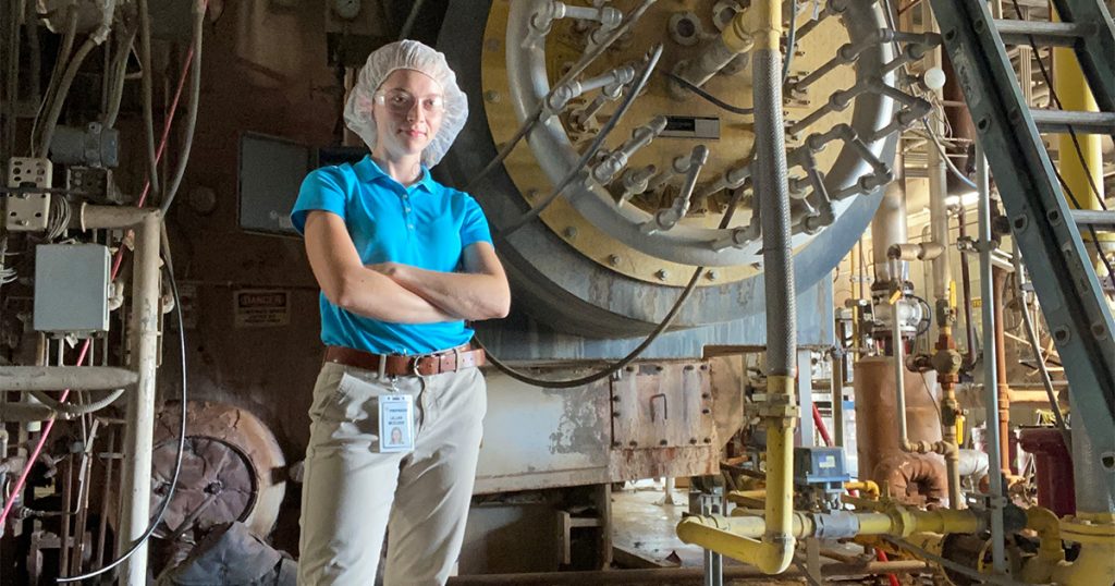 Lillian McCloud standing in the factory of Frito Lay