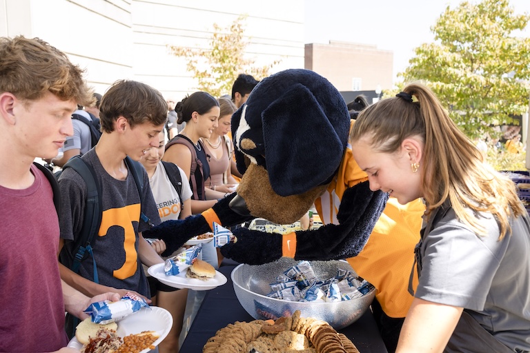 Smokey passing out food at the engineering cookout
