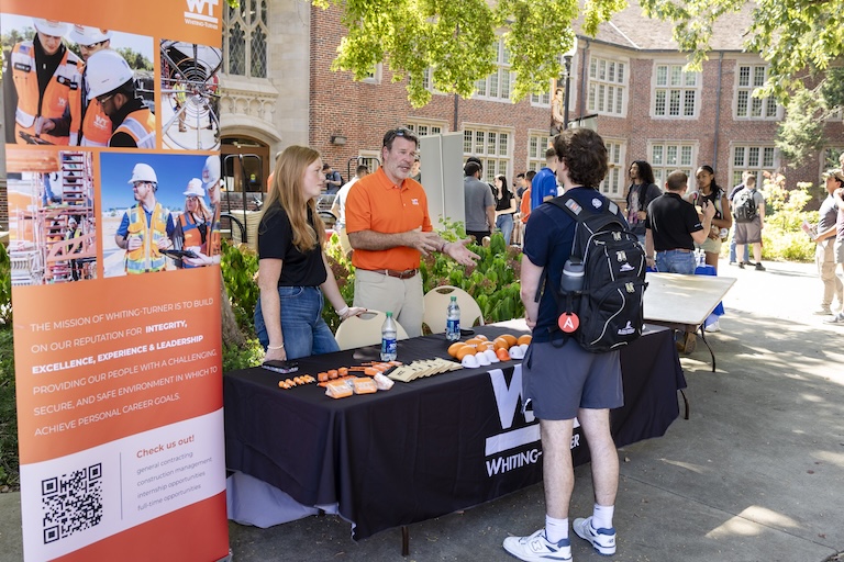 Whiting Turner speaking to students at the engineering cookout
