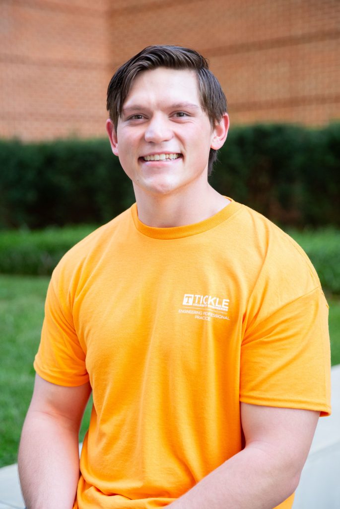 Headshot of Josiah Tucker